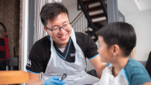 alt="Doctor House Call Singapore – doctor doing a home visit"