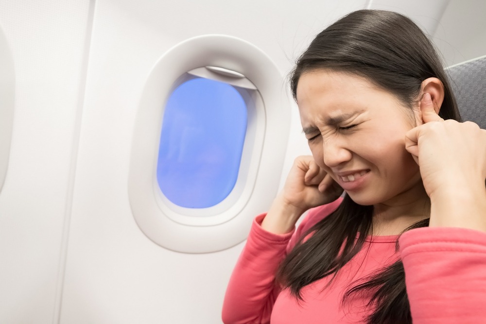 Pain in your ears is a common health issue when flying, due to the rapid change in air pressure.